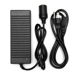 Black power adapter with cables on a white background