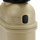 Close-up of a tan mobile battery with control panel on a white background