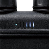 Close-up of a black electronic device with control buttons and indicator lights.