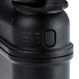 Close-up of a black outdoor battery with control buttons on a white background