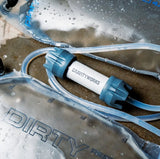 Water filtration system with 'GravityWorks' branding on a sandy background