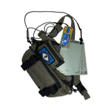 Green fanny pack with h2go water purifier and water data cards on a white background