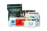 austere medicine consultants thermal injury field kit TIFK shown with first aid contents outside of the package on a white background