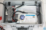 Technical device with 'STREAM' branding inside a grey plastic case