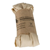 tan bear claw nitrile gloves in a brown paper wrapper with North American Rescue branding on a white background