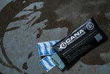 cana provisions personal water purification tablet kit black resealable pouch with aquatabs and water data card on a wet concrete floor