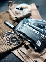 cana provisions usmc iwps water kit contents with decon kits and filter accessories on a table