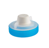 A plastic bottle cap with a bright blue ribbed base, a translucent white collar, and a white screw-on top, isolated on a white background.