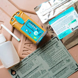 Water purification device with instructions and components on a tan background