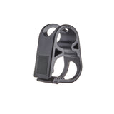 A black molded plastic hydration tube clamp with cutouts and a textured side panel, shown on a plain white background. The top edge has the words 'MADE IN USA' molded into it.