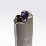 tan iceflask water bottle with the lid open on a white background