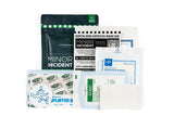 Collection of medical supplies including bandages and gauze on a white background