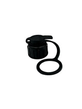 Black plastic water bottle cap on a white background