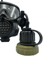 Close-up of a gas mask with a green and black bottle lid on a white background