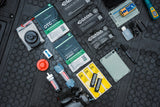 collection of assorted cana provisions water treatment and purification tools on a black background