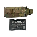 A tactical water bottle covered in a camouflage utility pouch with a strap, shown above a black CANA Provisions personal water decon kit pouch on a white background.