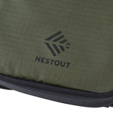 Green fabric with Nestout logo on a white background