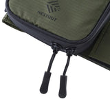 Green pouch with black zipper and 'NESTOUT' branding on a white background