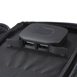 Black electronic device with USB ports on a textured black surface