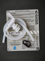 Water filtration system components on a grey surface with labels and instructions.