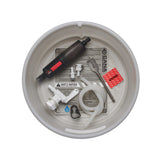 A top-down view of a white plastic bucket strainer containing white tubing, white spigot, spade bit, tubing clamp, MSR filter, quick disconnect fittings, red dirty tubing label and an instruction sheet on a white background.