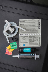 water filter components on a black case with labels and hoses