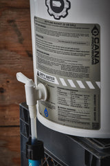 Water treatment system with a label on a wooden background