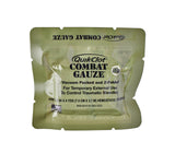 A single QuikClot Combat Gauze vacuum-packed Z-fold pouch in olive drab green, shown against a plain white background.
