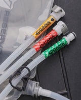 three colorful tubing labels applied to tubing
