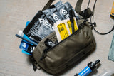cana provisions water boss kit with various water treatment and filter components on a concrete background