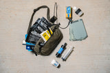 cana provisions water boss kit with various water treatment and filter components on a concrete background