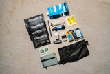cana provisions water boss kit with various water treatment and filter components on a concrete background